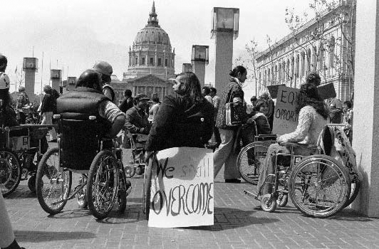 Black and white photo of protestors at United Nations Plaza in San Francisco in 1970s
